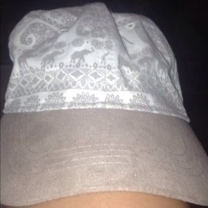 white hat with gray elephant patterns